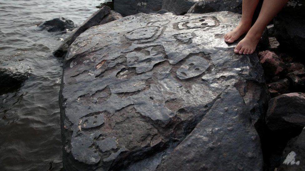 A view of ancient stone carvings on a rocky point of the Amazon river that were exposed after water levels dropped to record lows during a drought in Manaus, Amazonas state, Brazil October 23, 2023.